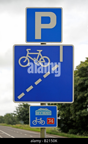 Road signs. Parking, cycle lane and The National Byway, route 74. Dumfries and Galloway, Scotland, United Kingdom, Europe. Stock Photo