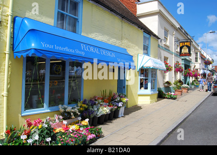 Florist shop and Bell Pub, West Street, New Alresford, Hampshire, England, United Kingdom Stock Photo