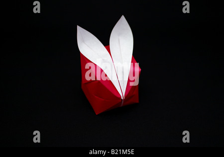 Red origami rabbit. Stock Photo