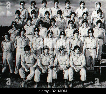 An old photograph of men and women soldiers lined up and in the army during the first and second world wars. Stock Photo
