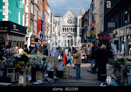 Passers by on Grafton street and Anne Street Dublin Ireland Stock Photo