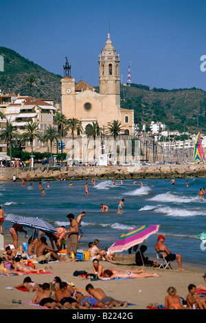 Platja de la Fragata Fragata Beach St Bartomeu I Santa Tecla church Sitges Costa de Garraf Spain Stock Photo