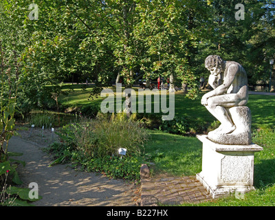 figure statue in the spa gardens in the town of Bad Orb Hesse Germany Stock Photo