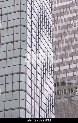 A section of one building, skyscraper overlapping another in the downtown of a major city. Stock Photo