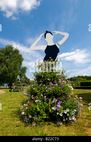 Modern dance floral display on roundabout, Descartes, Indre-et-Loire, France. Stock Photo
