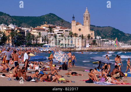 Platja de la Fragata Fragata Beach St Bartomeu I Santa Tecla church Sitges Costa de Garraf Spain Stock Photo