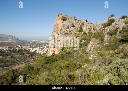 view to housing development & castle hilltop site, near Pedreguer, Marina Alta, Alicante Province, Comunidad Valenciana, Spain Stock Photo