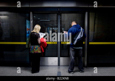 People waiting by Platform Edge Doors London Bridge Underground Station  Jubilee Line London Stock Photo