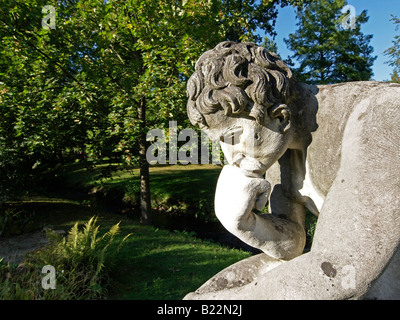 figure statue in the spa gardens in the town of Bad Orb Hesse Germany Stock Photo