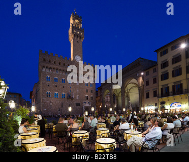Restaurant in front of the Palazzo Vecchio at night, Piazza della Signoria, Florence, Tuscany, Italy Stock Photo