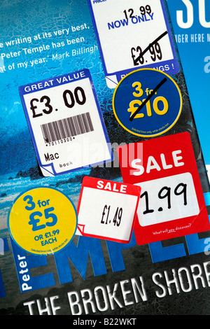 Book sale stickers advertising reduction in cost Stock Photo - Alamy