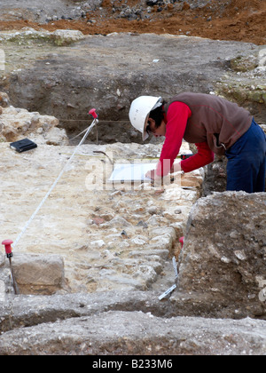 ARCHAEOLOGIST AT WORK ON CHURCHYARD DIG BEAUVAIS NORTHERN FRANCE Stock Photo