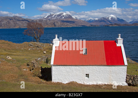 Looking north across Loch Shieldaig to Beinn Bhreac and Beinn Alligin to Inveralligin Highland Region Scotland April 2008 Stock Photo