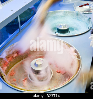 Making pink cotton candy at county fair Stock Photo