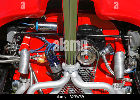 A customised engine in a VW Beetle car. Stock Photo