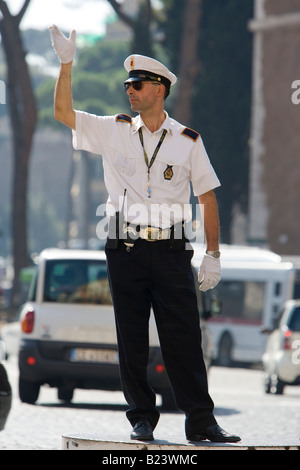 Traffic policeman directing traffic in Rome Italy Stock Photo