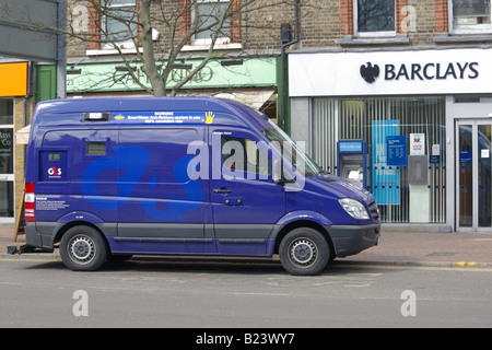 Group 4 Securicor van parked in shopping high street Stock Photo