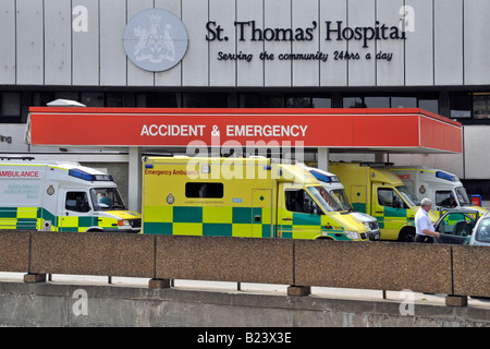 St Thomas hospital busy accident and emergency department entrance with waiting ambulances Lambeth London England UK Stock Photo
