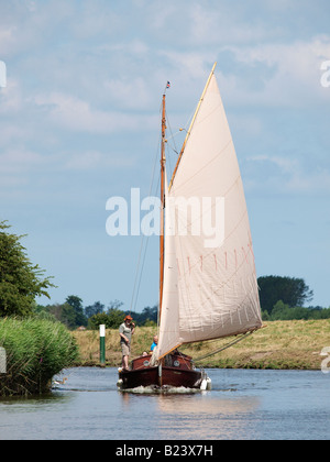 WOODEN SAILING BOAT FROM HUNTERS YARD LUDHAM ON THE RIVER BURE NEAR ST BENETS ABBEY NORFOLK Stock Photo