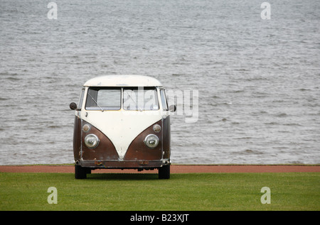 A VW camper van parked on a green at the seaside Hunstanton, England. Stock Photo