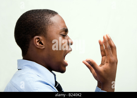 African young business professional, screaming, MBA student or such Stock Photo