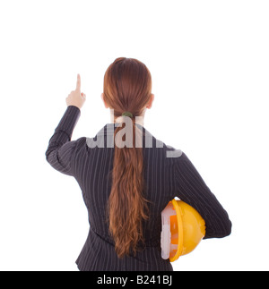 Young woman in a construction concept isolated on white. Stock Photo