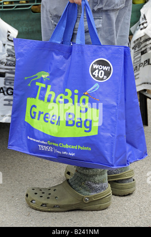 The big green bag Tesco reusable shopping bag held by man Islington Farmers Market London UK Stock Photo Alamy