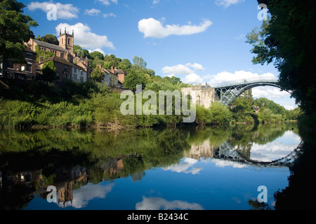 Ironbridge village world's first iron bridge spanning banks of River Severn in late evening summer light Ironbridge Shropshire Stock Photo