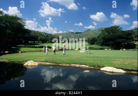 Rustenburg, South Africa, people, landscape, men on putting green of Gary Player golf course at Sun City, African landscapes, sports, golfers Stock Photo