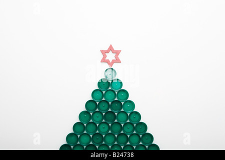 A christmas tree made out of bottle tops Stock Photo