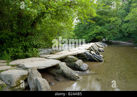 Tarr Steps an Ancient Clapper Bridge in Exmoor National Park Somerset England Stock Photo