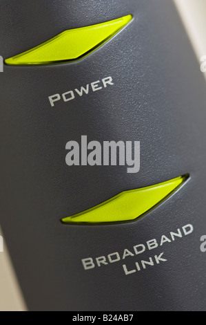 Macro shot of broadband internet router with power and broadband link indicators on. Stock Photo