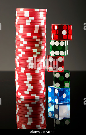 Stacks of dice and gambling chips Stock Photo
