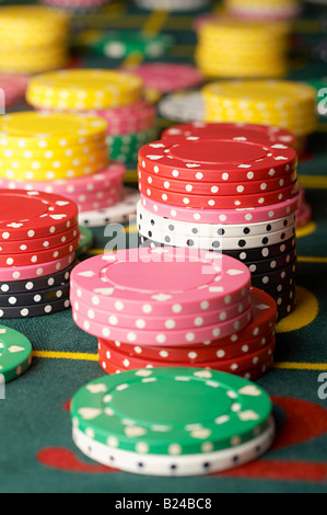 Roulette chips stacked up Stock Photo - Alamy
