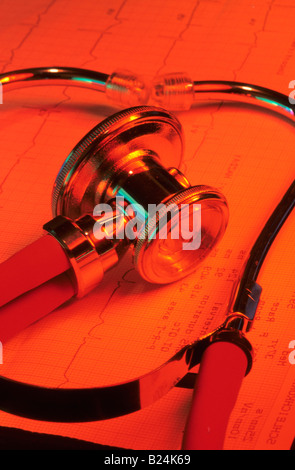 RED STILL LIFE STETHOSCOPE SOUND DETECTION DEVICE, OFTEN USED DURING MEDICAL EXAMS TO LISTEN TO HEART BEATS AND BODY SOUNDS. Stock Photo