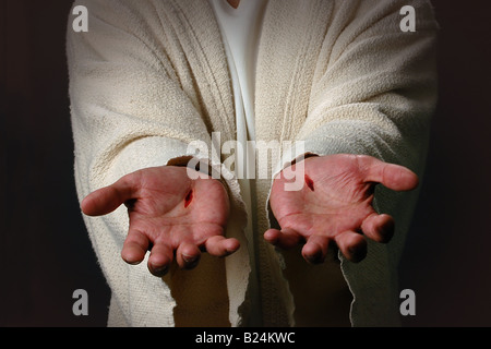 Resurrected Jesus Christ with the scars of the nails on his hands Stock