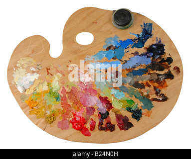 Artist s palette with oil colors and solvent container Stock Photo