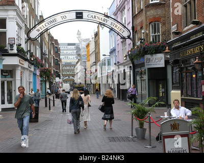 welcome to carnaby street swinging 60's london sign over street england uk gb Stock Photo