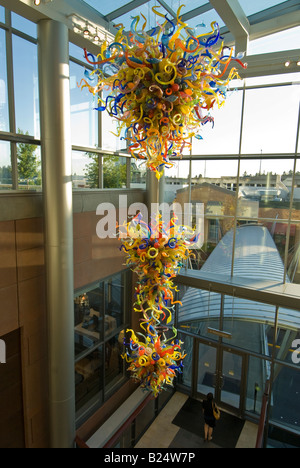 Glass sculpture by glass artist Dale Chihuly hangs in the atrium of Lincoln Square in downtown Bellevue Washington Stock Photo