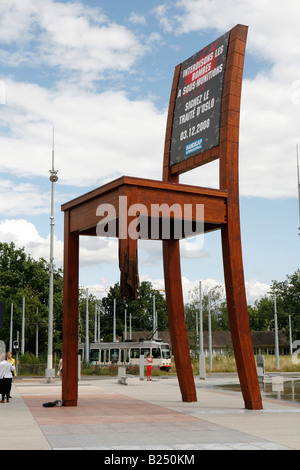 The Broken Chair by Daniel Berset, memorial to the victims of landmines, in front of the United Nations Building, Geneve, Swiss. Stock Photo