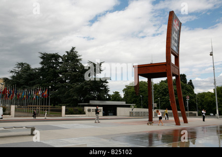 The Broken Chair by Daniel Berset, memorial to the victims of landmines, in front of the United Nations Building, Geneve, Swiss. Stock Photo