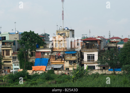 Residential area along the Red River in Hanoi close to the Long Bien bridge Stock Photo