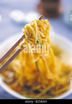 Korean cuisine - noddles and chopsticks Stock Photo