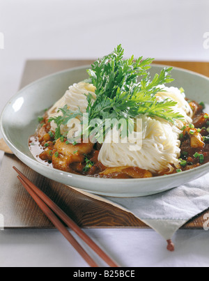 Korean cuisine - noddles and chopsticks Stock Photo