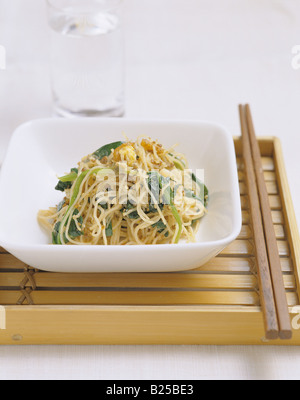 Korean cuisine - noddles and chopsticks Stock Photo