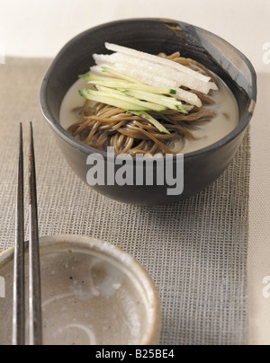 Korean cuisine - noddles and chopsticks Stock Photo