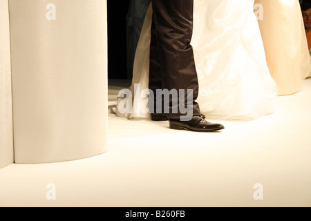 model bride and groom catwalk, trade fashion show Stock Photo