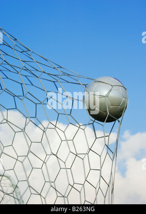 Soccer Ball in Goal Net Stock Photo