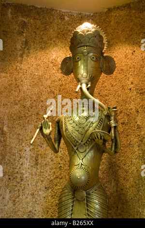 A bronze sculpture of the Hindu God Ganesha. The sculpture is produced by the lost wax process. Stock Photo