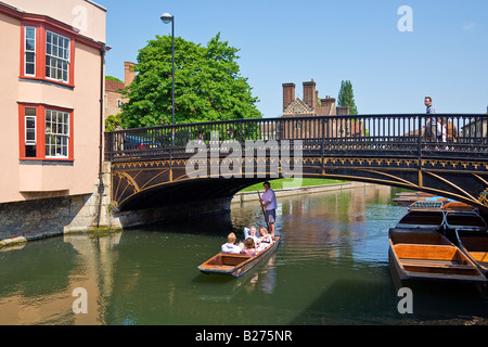 A view of Magdalene Bridge from River Cam level, punts on the river